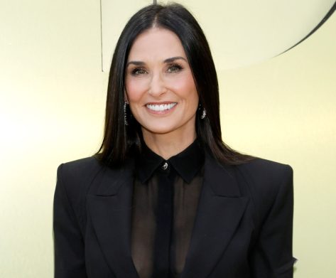 Demi Moore Shares Swimsuit Photo "in Paradise"