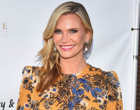 ’90s Icon Natasha Henstridge Shares Swimsuit Photo of “Happy Sunday”