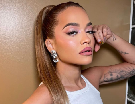 Rita Ora Shares Swimsuit Photo of "Random Moments"