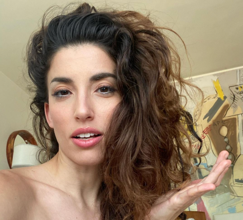 Big Bang Theory Star Tania Raymonde Shares Swimsuit Photo of “Happiness”