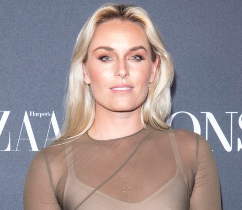 Lindsey Vonn in Orange Leggings Lifts Weights and Works Out 
