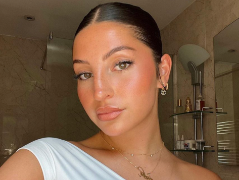 Love Island Star Lydia Karakyriakou Wows in Sauna on "Staycation"