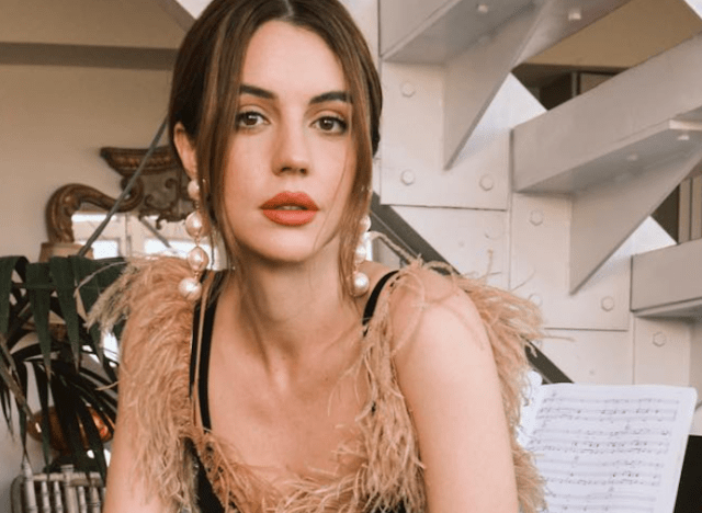 Adelaide Kane in Workout Gear Says "Live, Laugh and Leg Cramps"