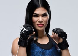 MMA's Rachael Ostovich in Workout Gear Punches the Bag 