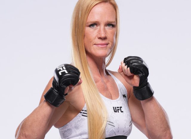 Holly Holm In Workout Gear Is "Broken-Hearted But Never Broken"