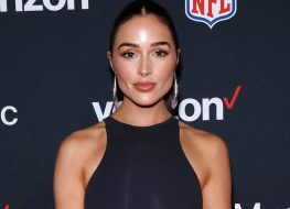 Olivia Culpo in Two-Piece Workout Gear Eats Fast Food on a Plane