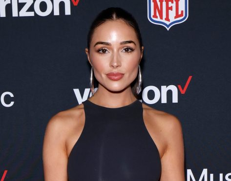 Olivia Culpo in Two-Piece Workout Gear Eats Fast Food on a Plane