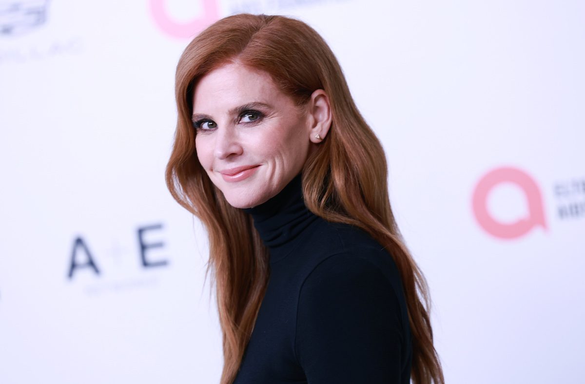 Suits Star Sarah Rafferty in Workout Gear Goes Surfing