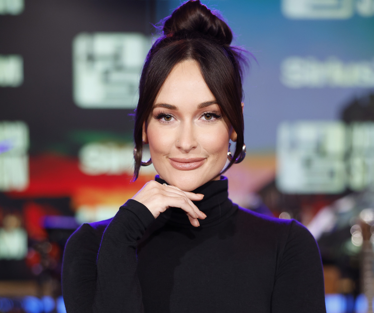 Kacey Musgraves In Two-Piece Workout Gear Poses With Peacock