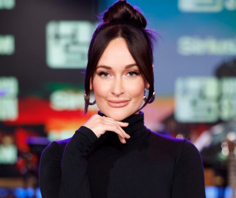 Kacey Musgraves in Two-Piece Workout Gear Poses With Peacock