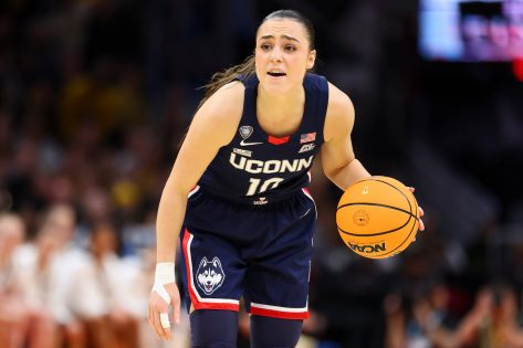 WNBA Star Nika Mühl In Workout Gear Poses On Seattle Storm Court