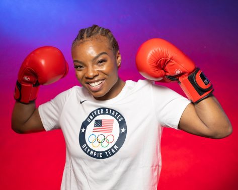 Morelle McCane in Workout Gear Uses Punching Bag and Says "Just Do it"