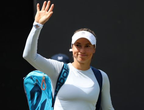 Yulia Putintseva in Workout Gear Says "Hello"