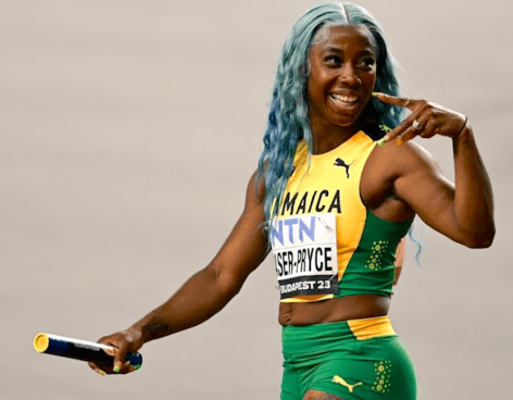 Shelly-Ann Fraser-Pryce in Two-Piece Workout Gear Says "Momentum Takes You Forward!"