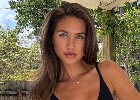 Influencer Brit Manuela in Two-Piece Workout Gear Extolls "Hard Work and Discipline"