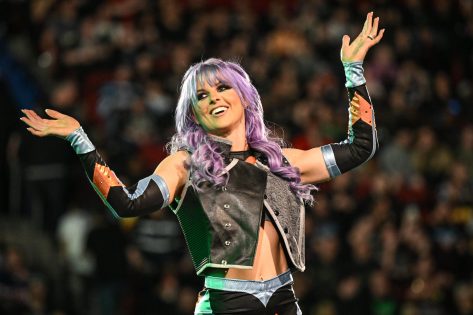 WWE’s Candice LeRae in Two-Piece Workout Gear Goes “From Sweet to Evil”