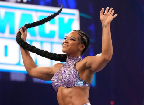 WWE’s Bianca Belair in Two-Piece Workout Gear Flexes Her Bicep