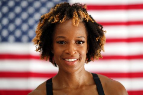 Track and Field Star Natasha Hastings in Two-Piece Workout Gear Cheers “Mental Health”