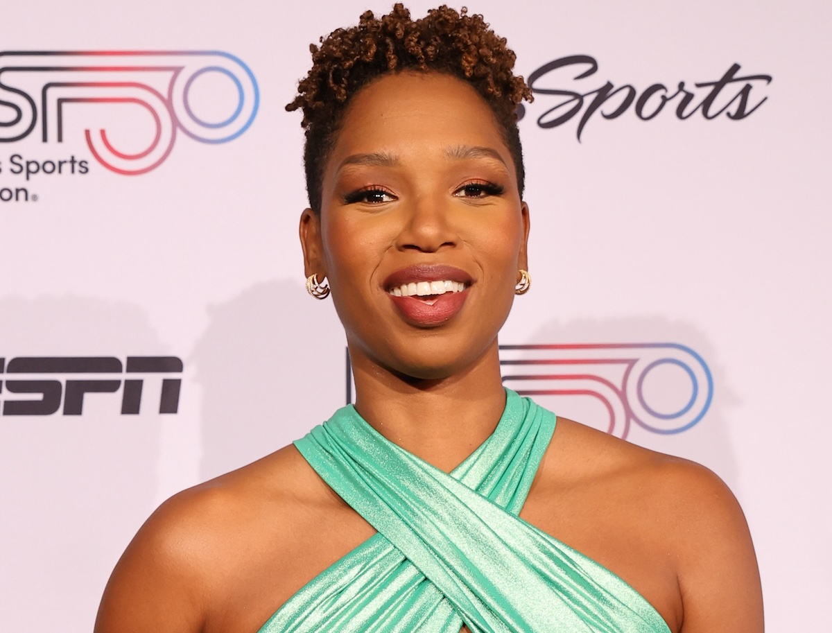 ESPN Analyst Monica McNutt In Workout Gear Does Kettlebell Stretching