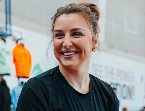 Weightlifter Katherine Vibert in Two-Piece Workout Gear Says “The Show Must Go On”