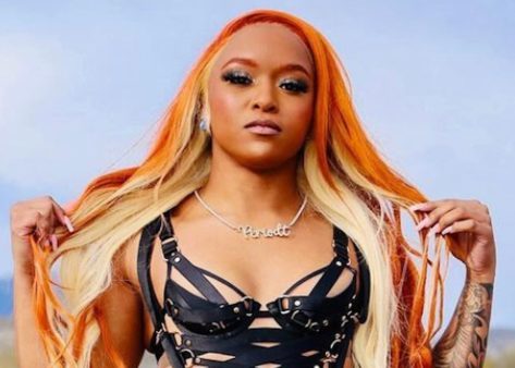 Wrestler Kiera Hogan in Two-Piece Workout Gear Looks Like “Barbie”