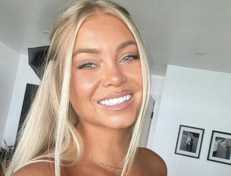 Golf Stunner Hailey Rae Ostrom in One-Piece Workout Dress Does "Attempt at a Trick"