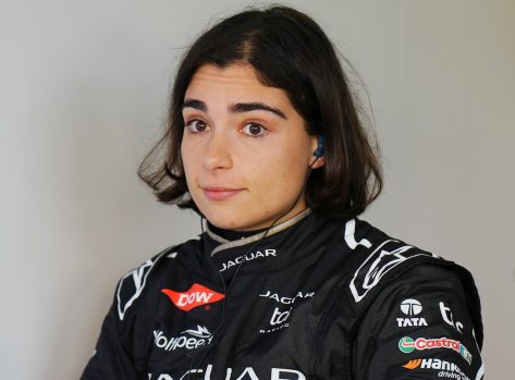 Motorsport Racer Jamie Chadwick in Two-Piece Workout Gear Makes "Big Push"