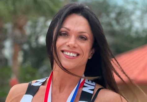 Ms. Olympia Competitor Oksana Grishina in Two-Piece Workout Gear Says "Work Hard, Be Kind"