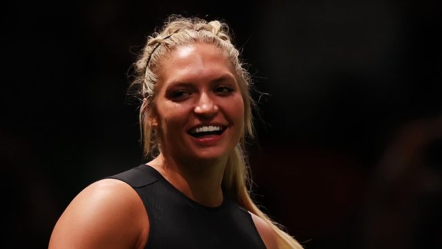 CrossFit Athlete Haley Adams in Two-Piece Workout Gear Says "See You Soon"