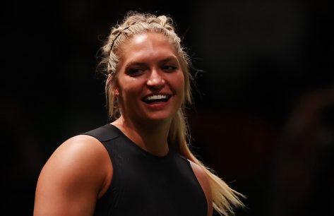 CrossFit Athlete Haley Adams in Two-Piece Workout Gear Says "See You Soon"