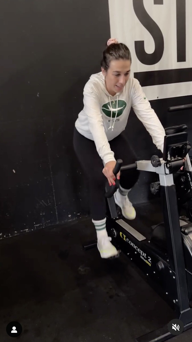 Joanna Jedrzejczyk is seen on a stationary bike.