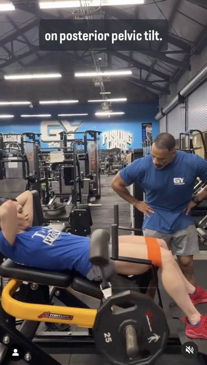 Ashley Kaltwasser is seen doing weighted hip thrusts.