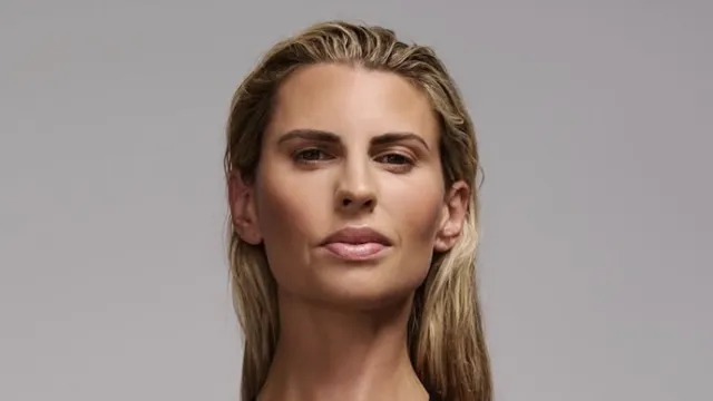 Tiffiny Hall in Two-Piece Workout Gear Says "Inch pebbles, not milestones"