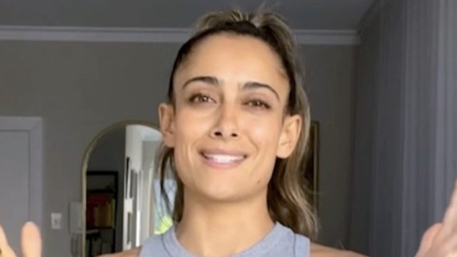 Fitness Influencer Shona Vertue in Two-Piece Workout Gear Demonstrates "Flexibility Work"