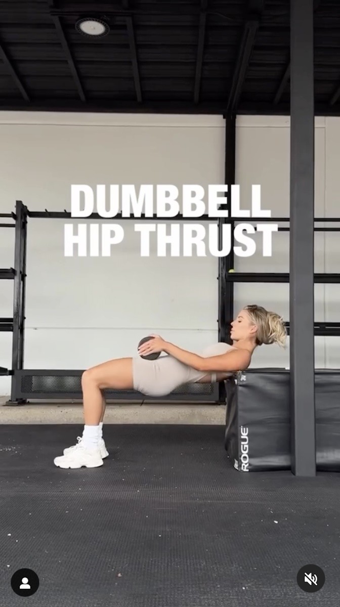 Heidi Somers does hip thrusts with a dumbbell