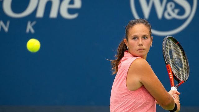Tennis Star Daria Kasatkina in Two-Piece Workout Gear is in "Paradise"