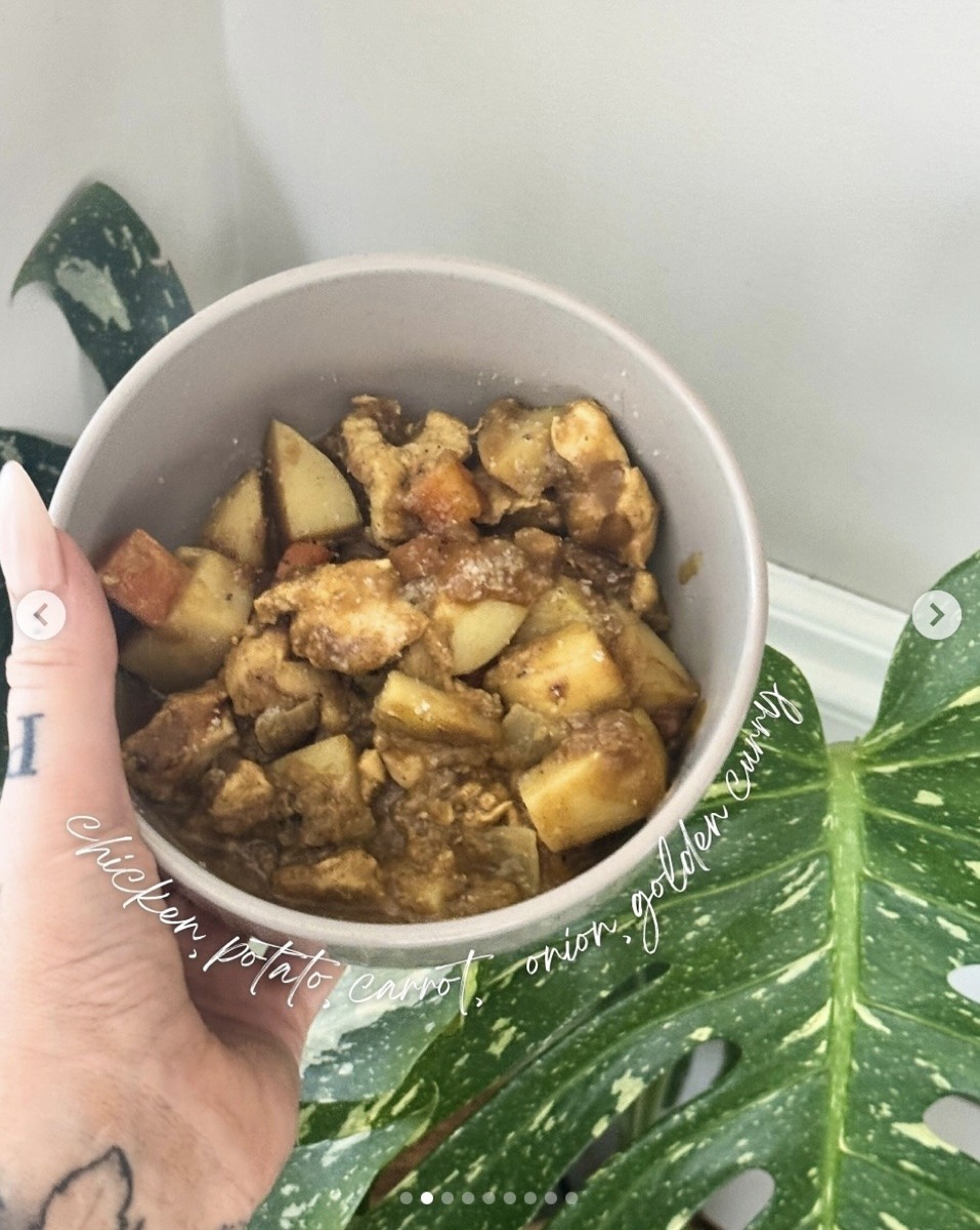 Rachel Aust snaps a photo of her chicken, potato, carrot and golden curry dish.