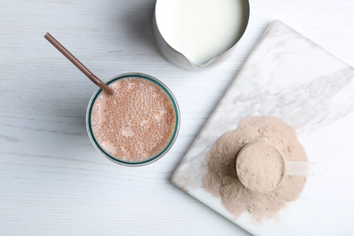 Glass,With,Protein,Shake,,Jug,Of,Milk,And,Powder,On