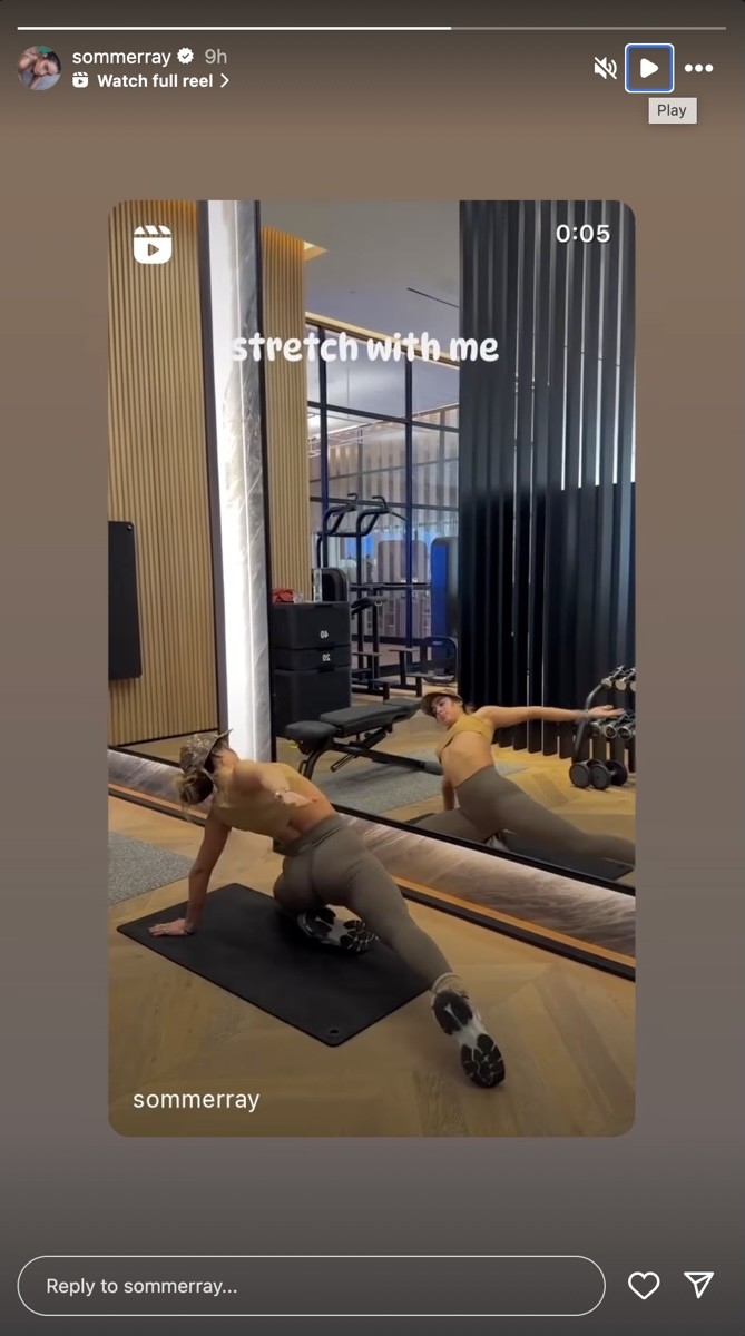 Sommer Ray is seen stretching during yoga.