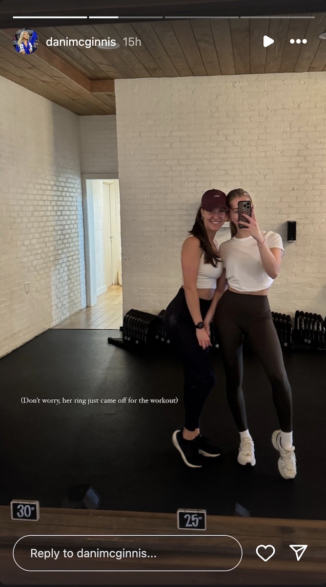 Dani McGinnis and a friend take a mirror selfie.