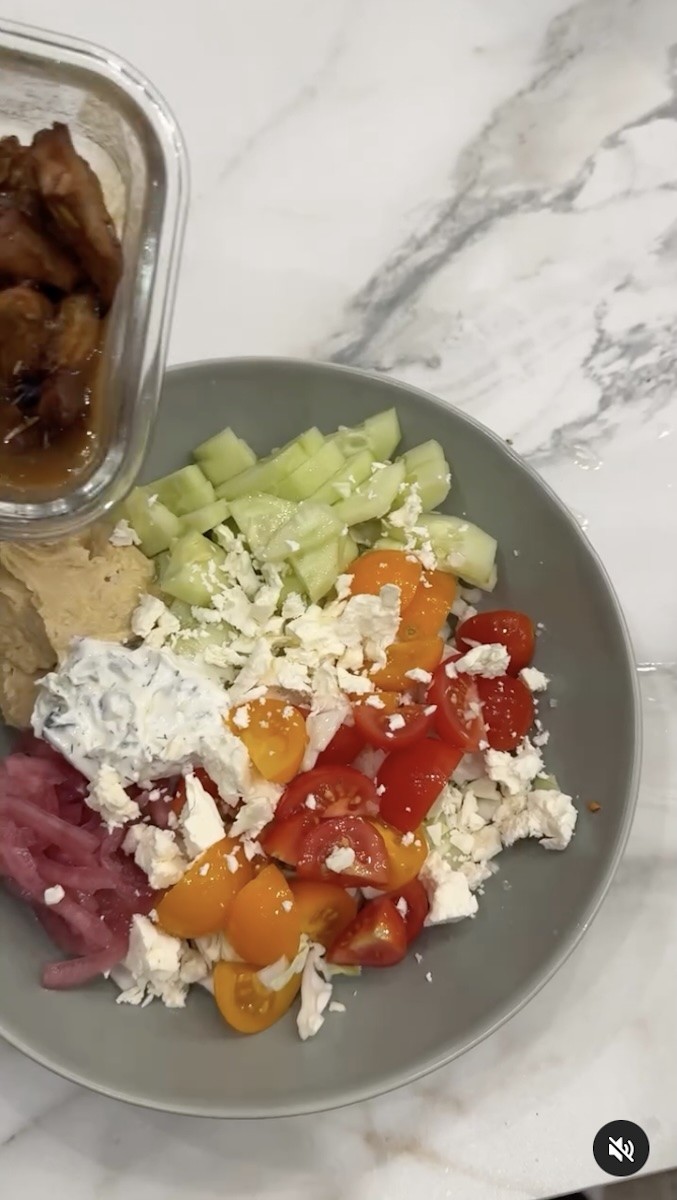 A photo of Witney Carson's plate that has a serving of cucumbers.