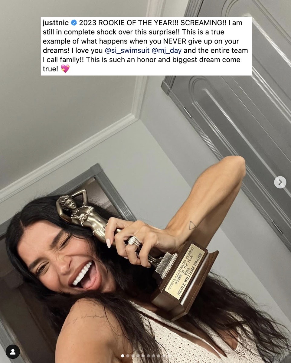 Nicole Williams English excitedly showing off her SI award for Rookie of the Year.