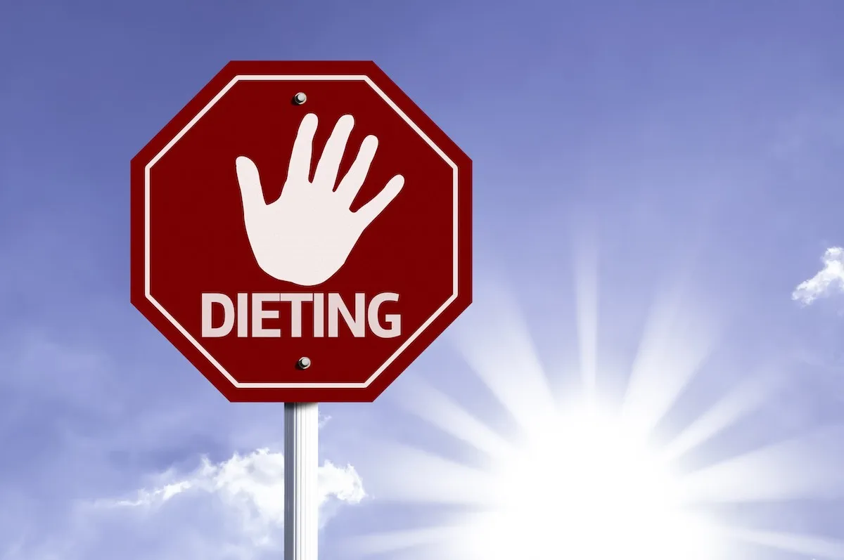 Stop,Dieting,Red,Sign,With,Sun,Background