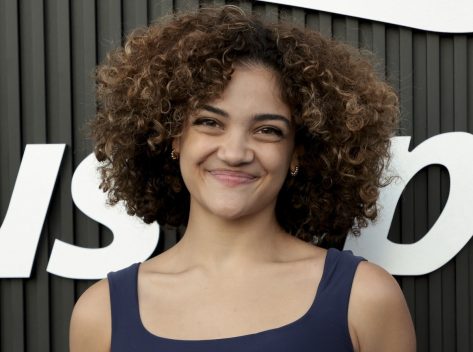 Gymnast Laurie Hernandez Shows Off Six-Pack Abs Under Waterfall During "Happy Holidays"
