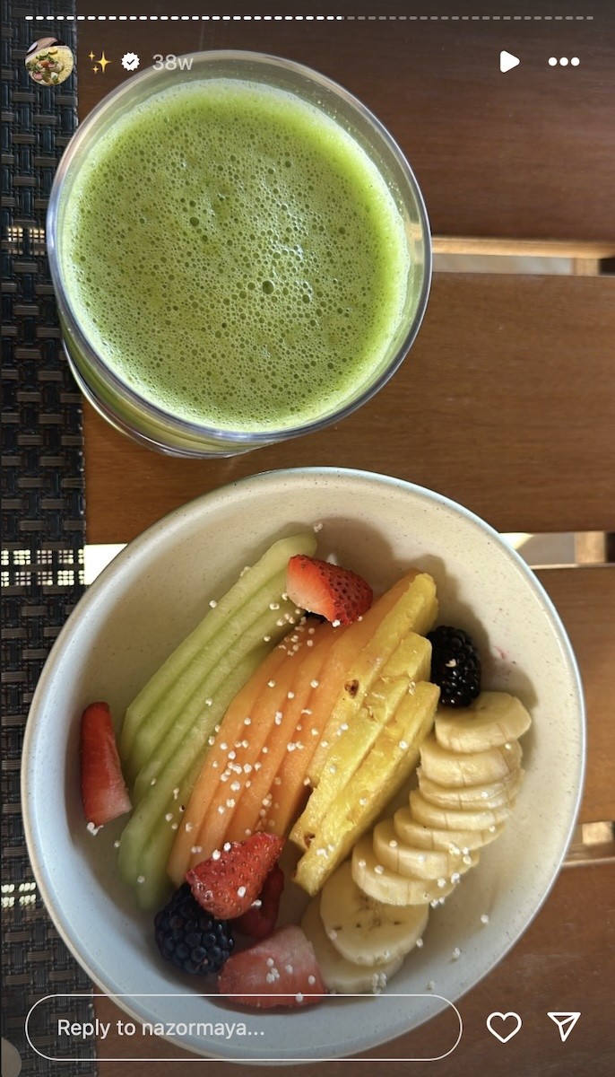 Fruit bowl containing bananas and other fruit.