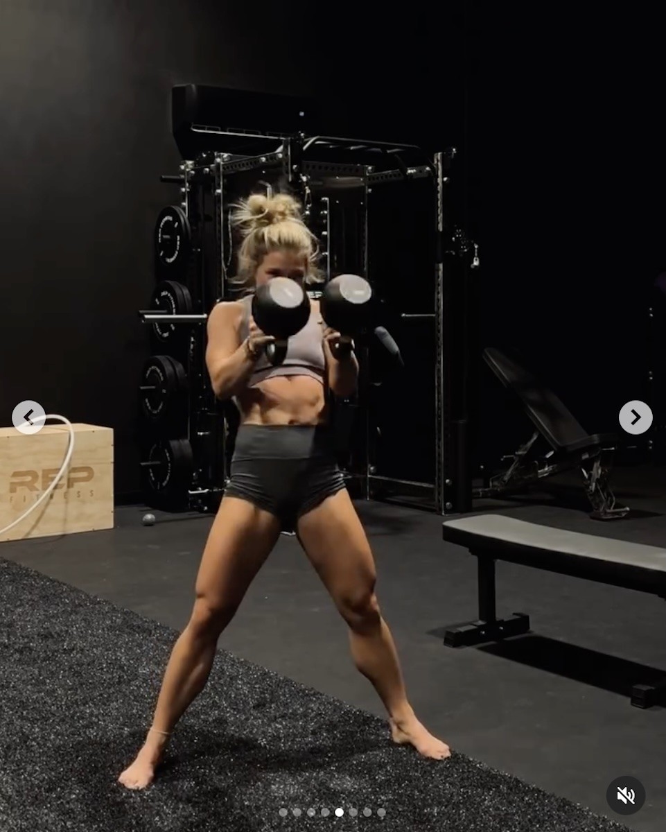 Claire P. Thomas strength trains with kettlebell swings.