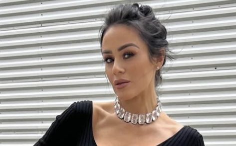 Influencer Brittany Coutu in Two-Piece Workout Gear Says "Train Smarter, Not Harder"