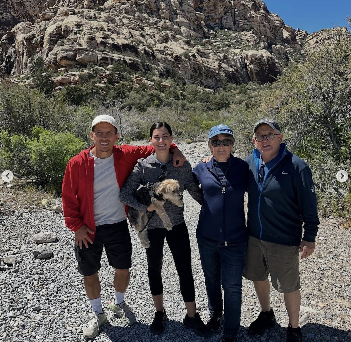 Megan Olivi is seen hiking with family.