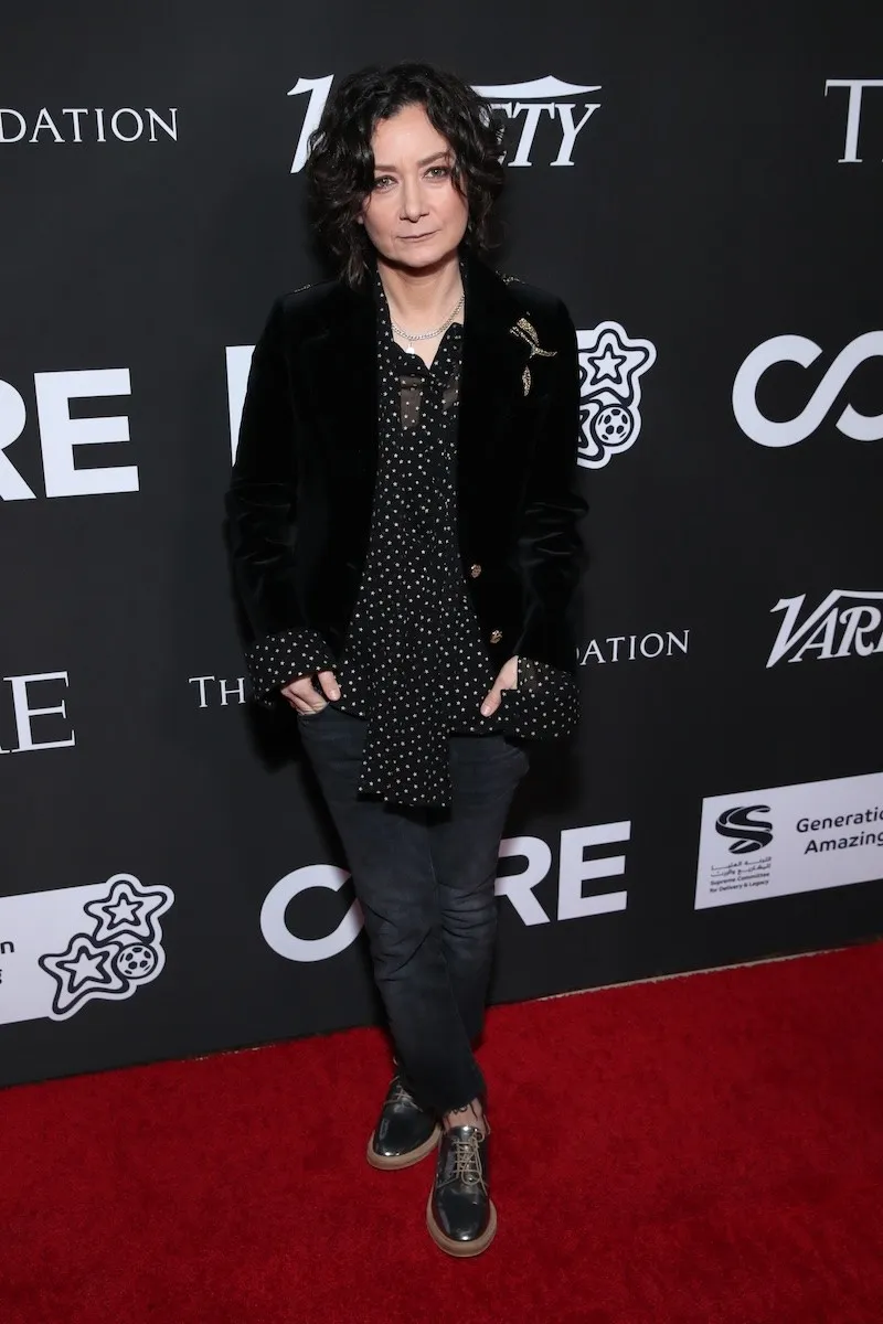 Sara Gilbert poses on the red carpet.