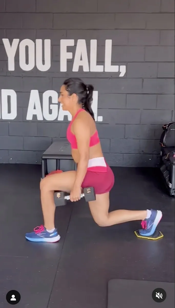 Michelle Khare is seen doing lunges.